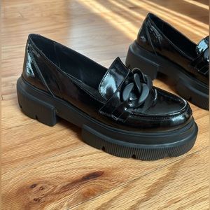 Womens Loafer with black plastic accessory